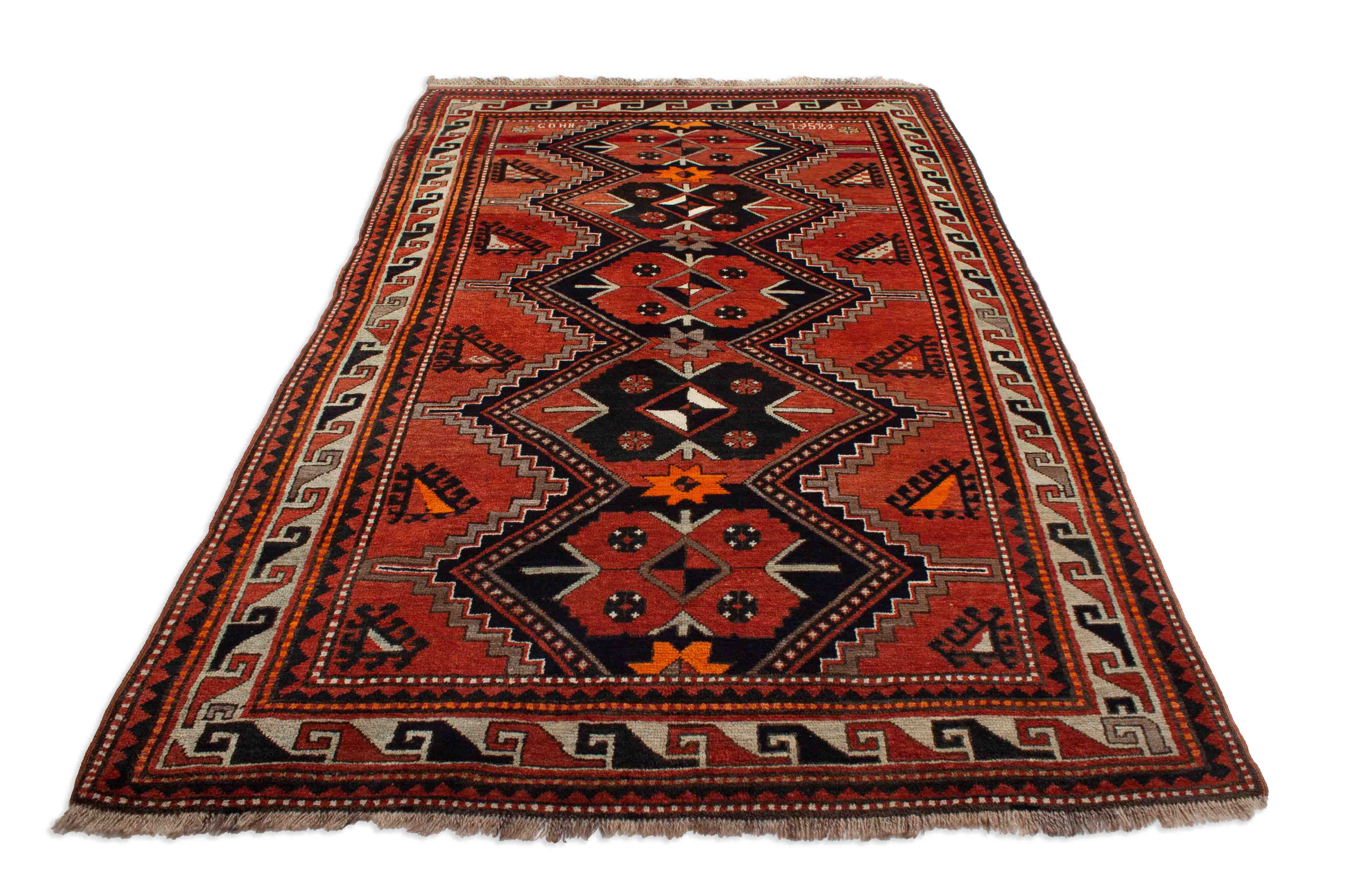 Eine Fotoaufnahme eines Kazak Teppichs.