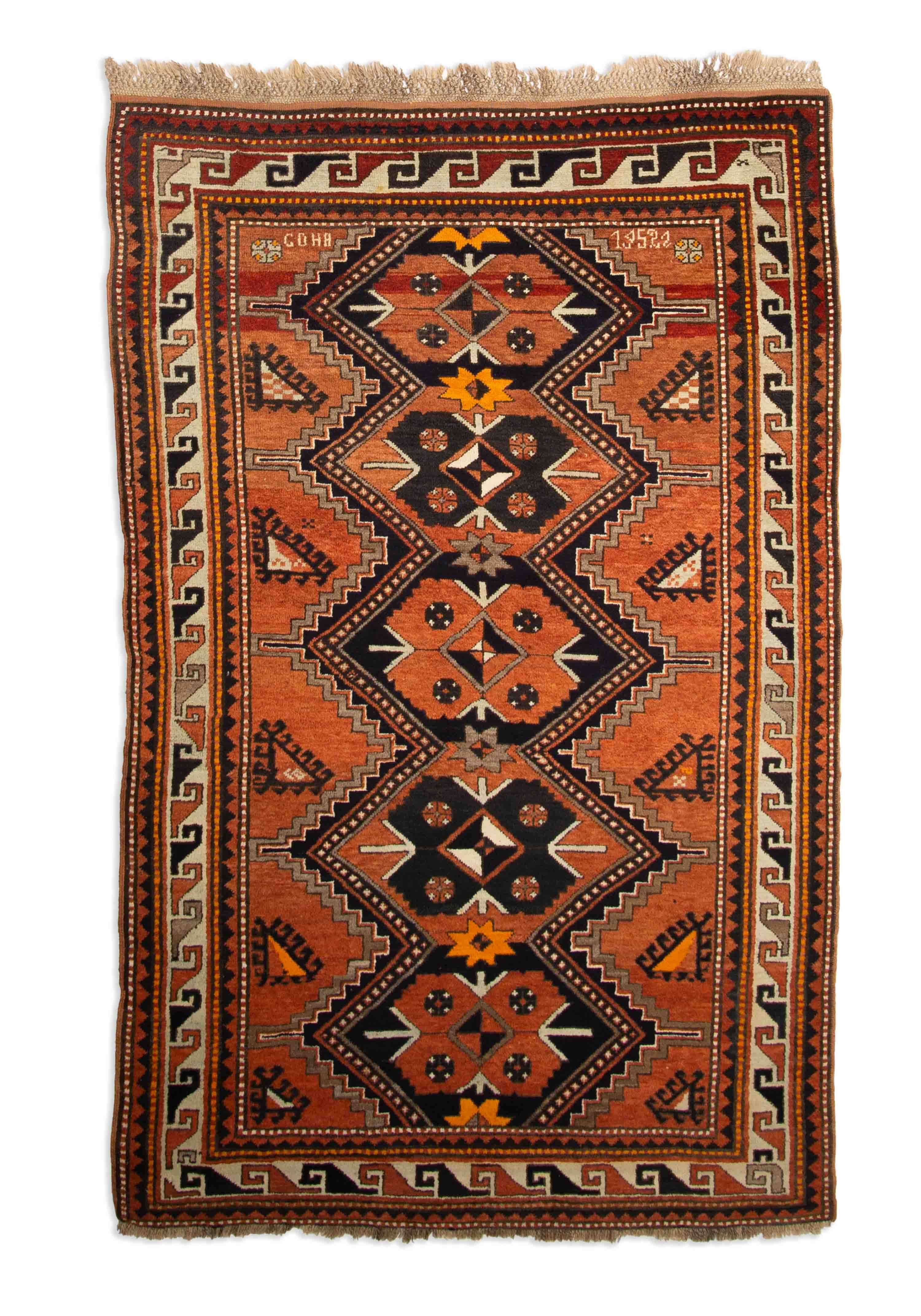 Eine Fotoaufnahme eines Kazak Teppichs.