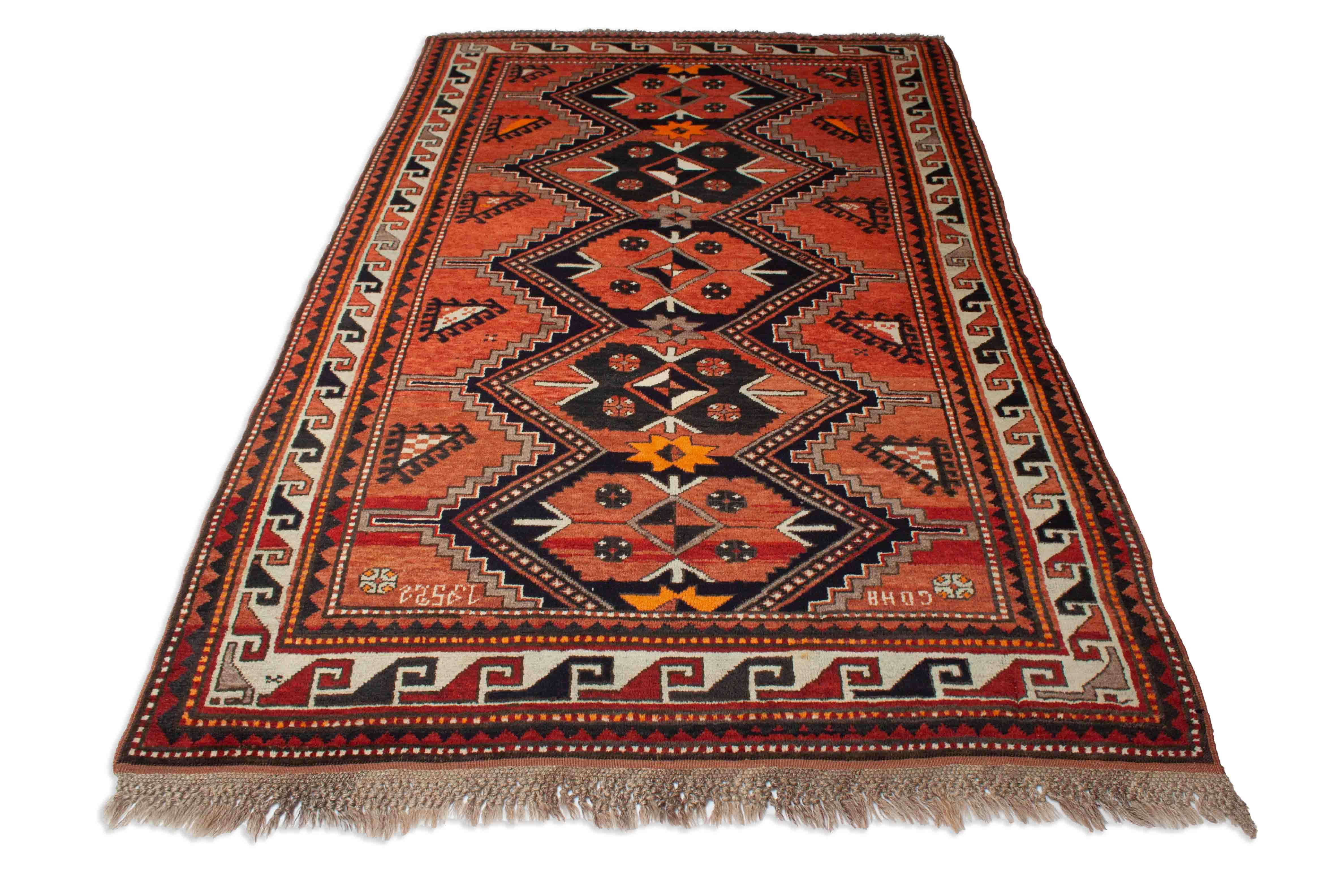 Eine Fotoaufnahme eines Kazak Teppichs.