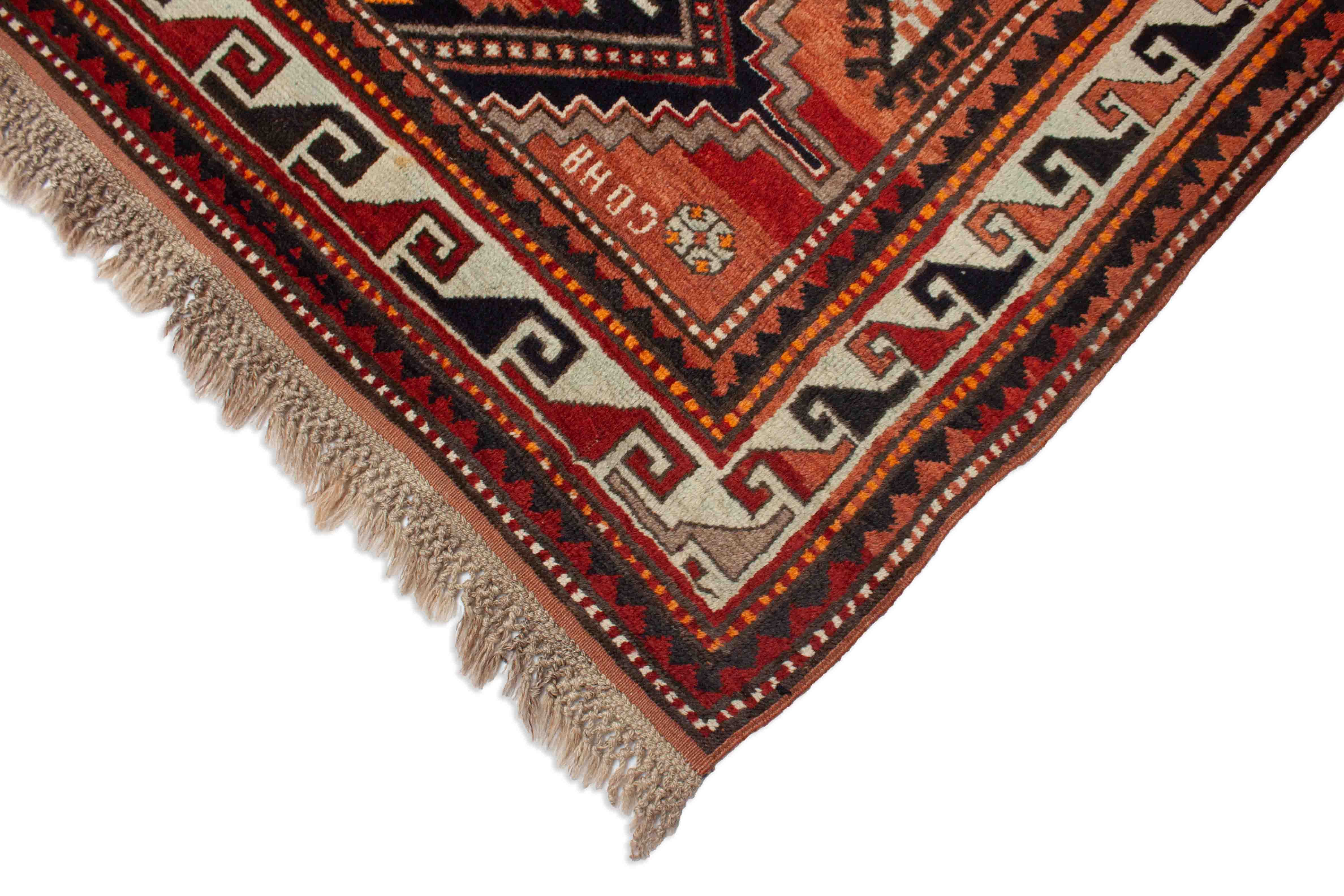 Eine Fotoaufnahme eines Kazak Teppichs.