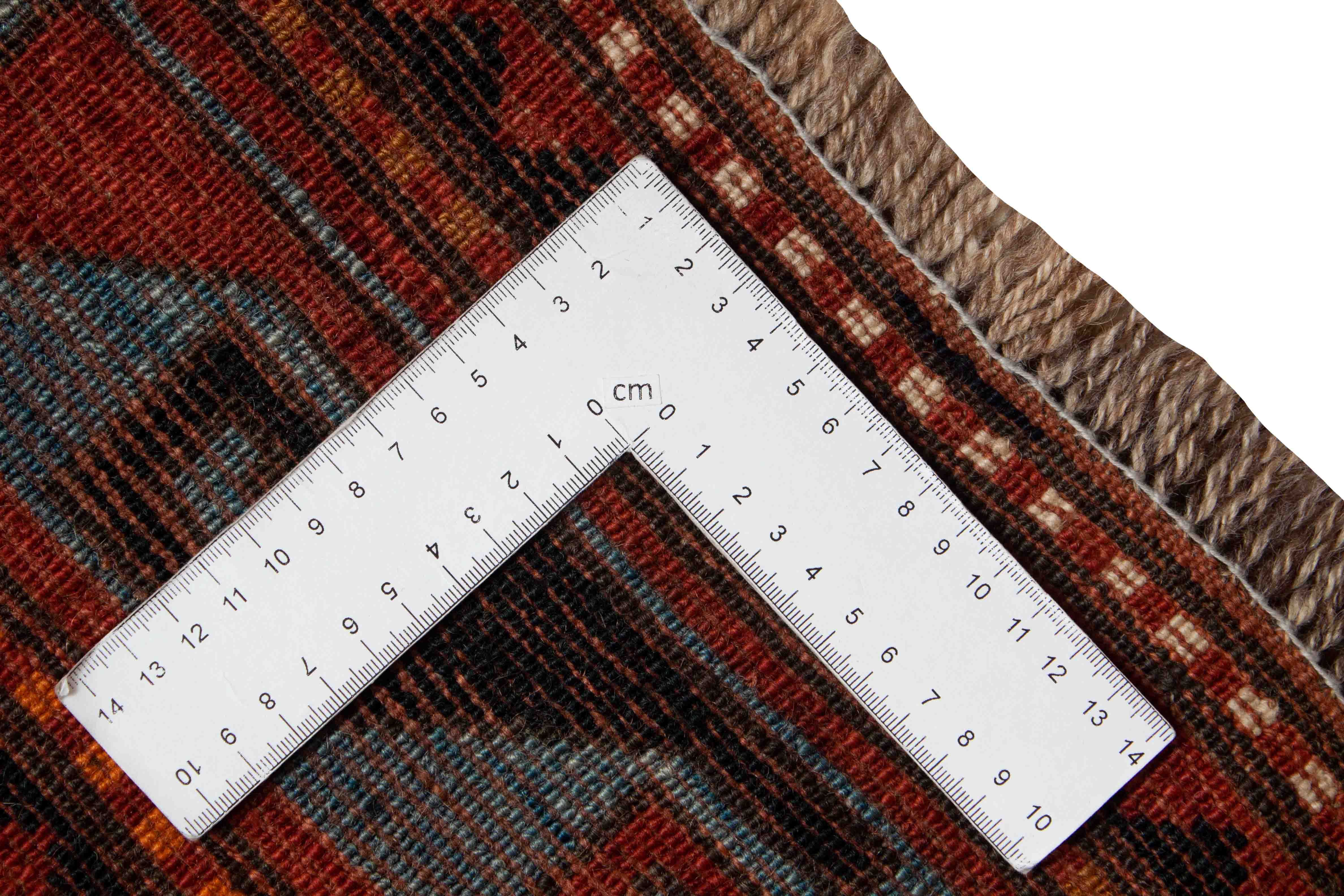 Eine Fotoaufnahme eines Kazak Teppichs.