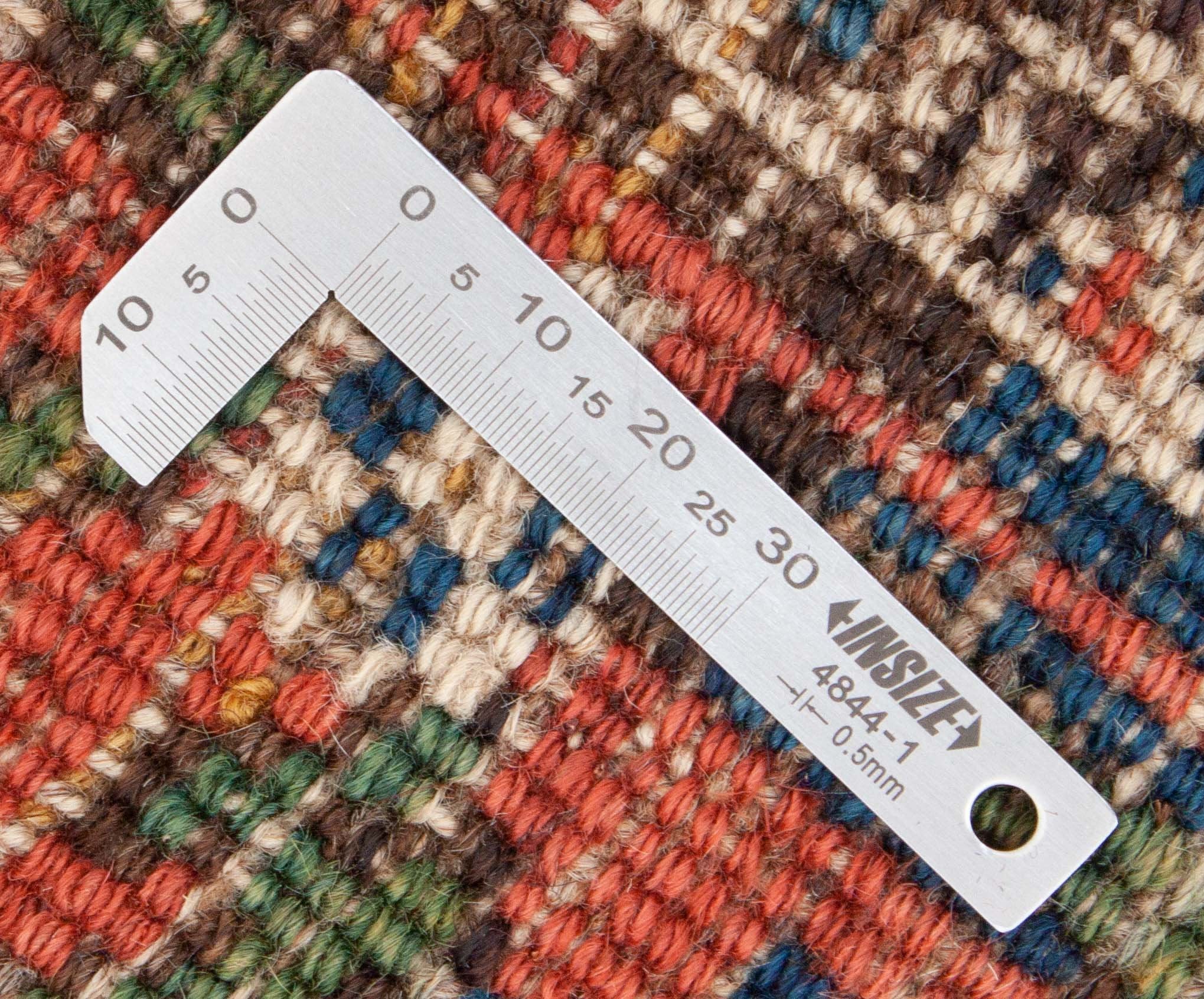 Eine Fotoaufnahme eines Bidjar Teppichs.