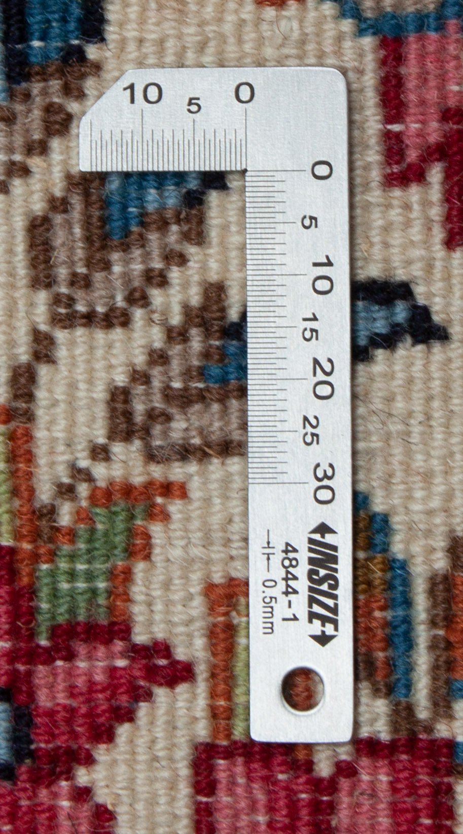 Eine Fotoaufnahme eines Kerman Teppichs.