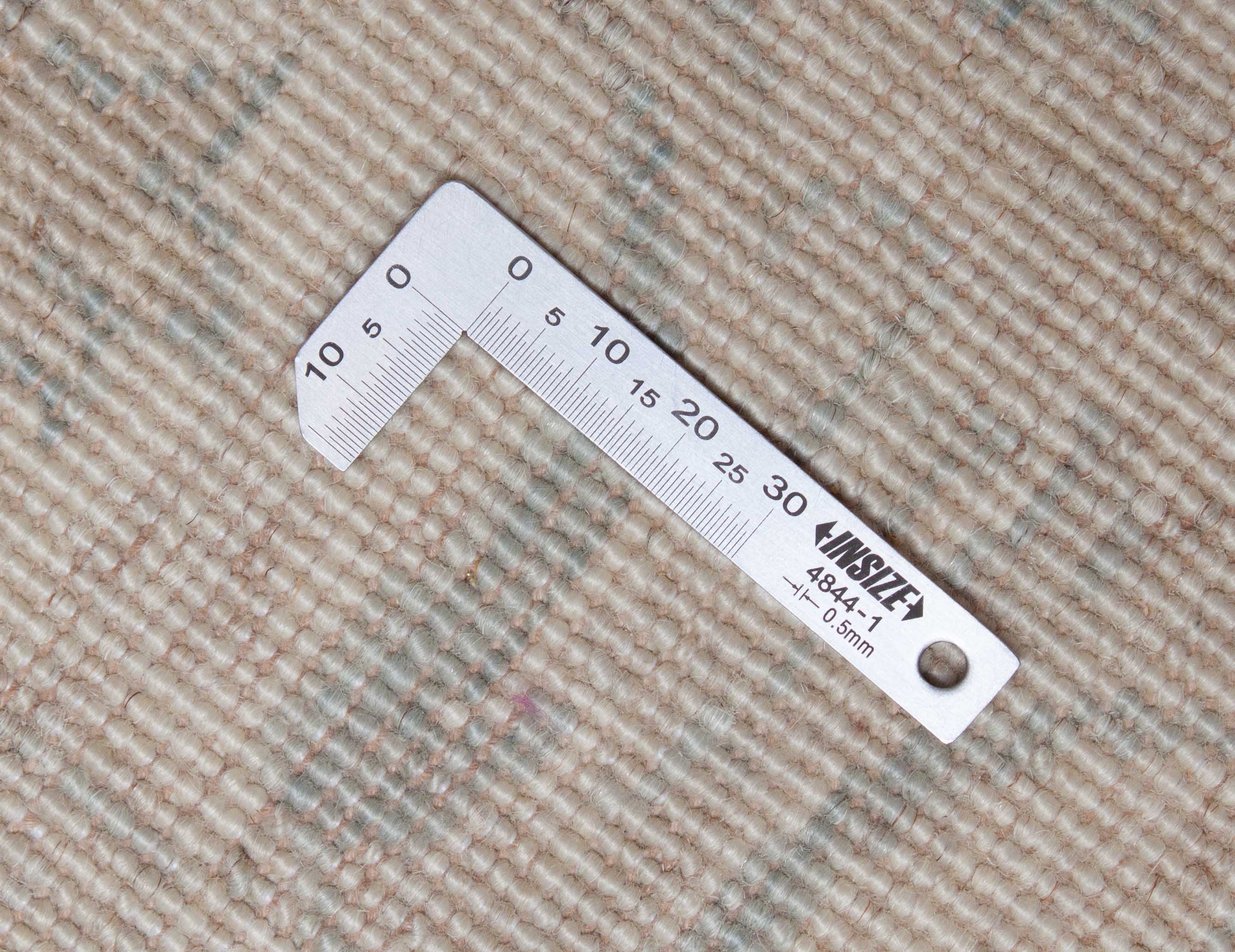 Eine Fotoaufnahme eines Farahan Teppichs.