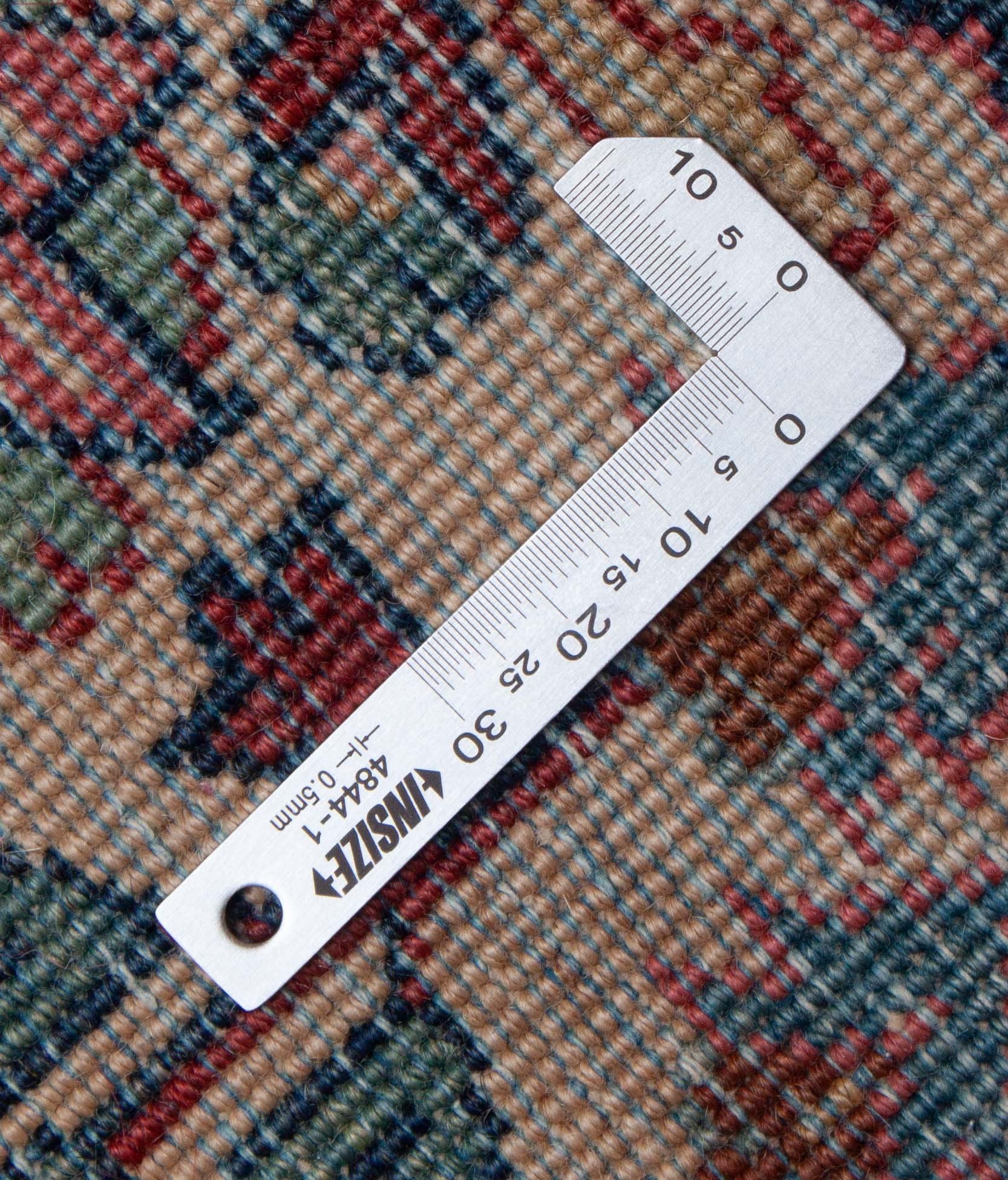 Eine Fotoaufnahme eines Sarough Teppichs.