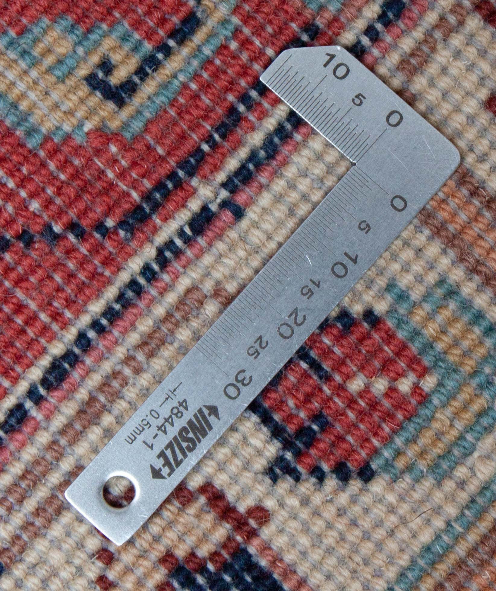 Eine Fotoaufnahme eines Sarough Teppichs.