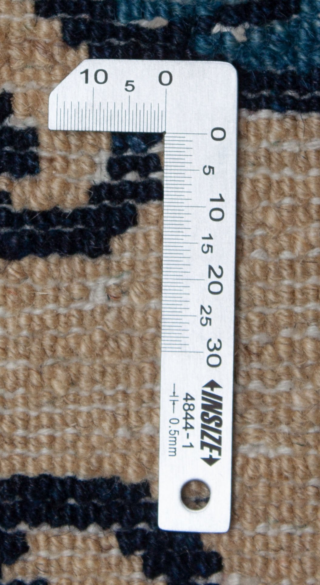 Eine Fotoaufnahme eines US Import China Teppich Teppichs.