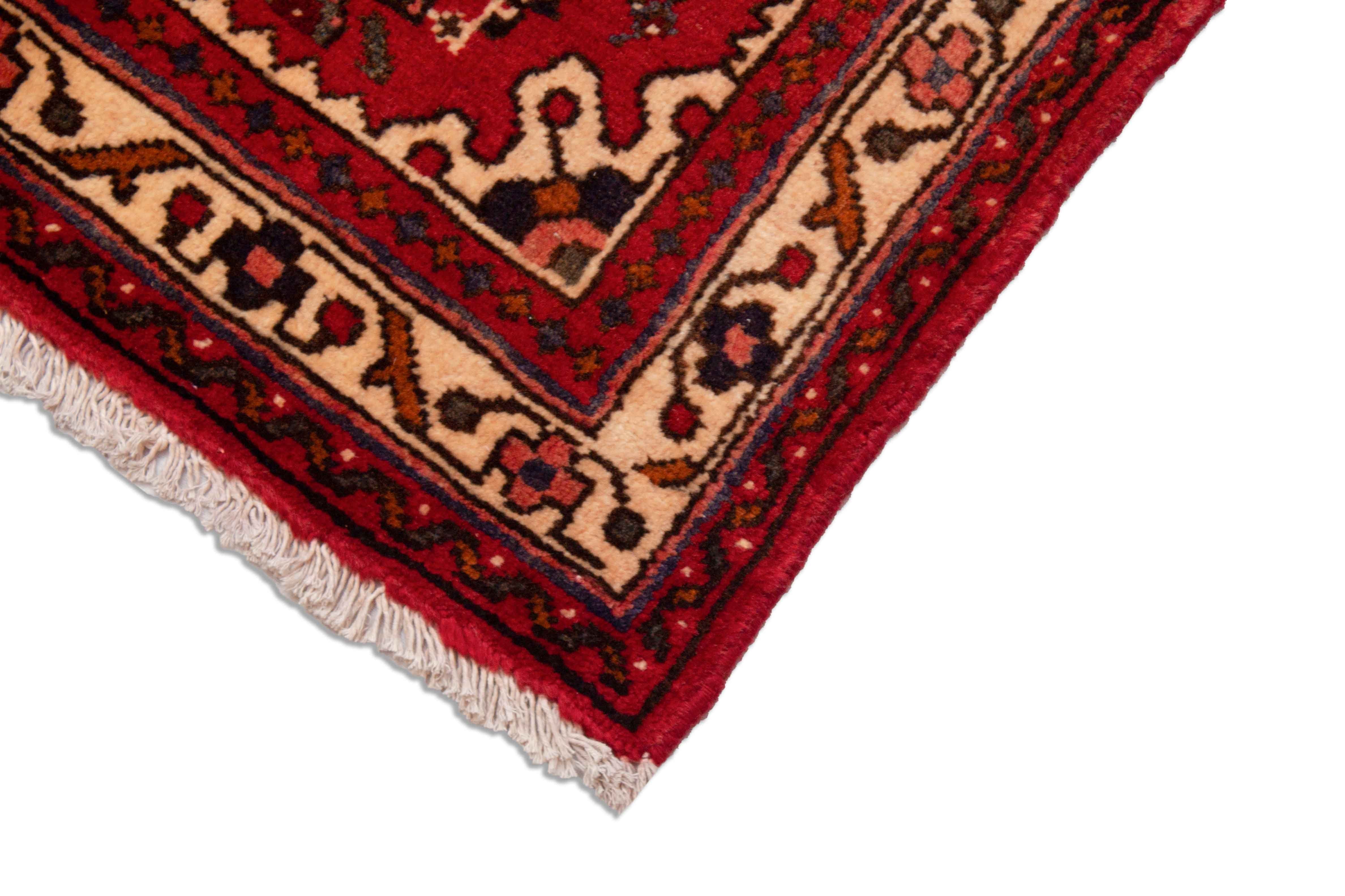 Eine Fotoaufnahme eines Hosseinabad Teppichs.