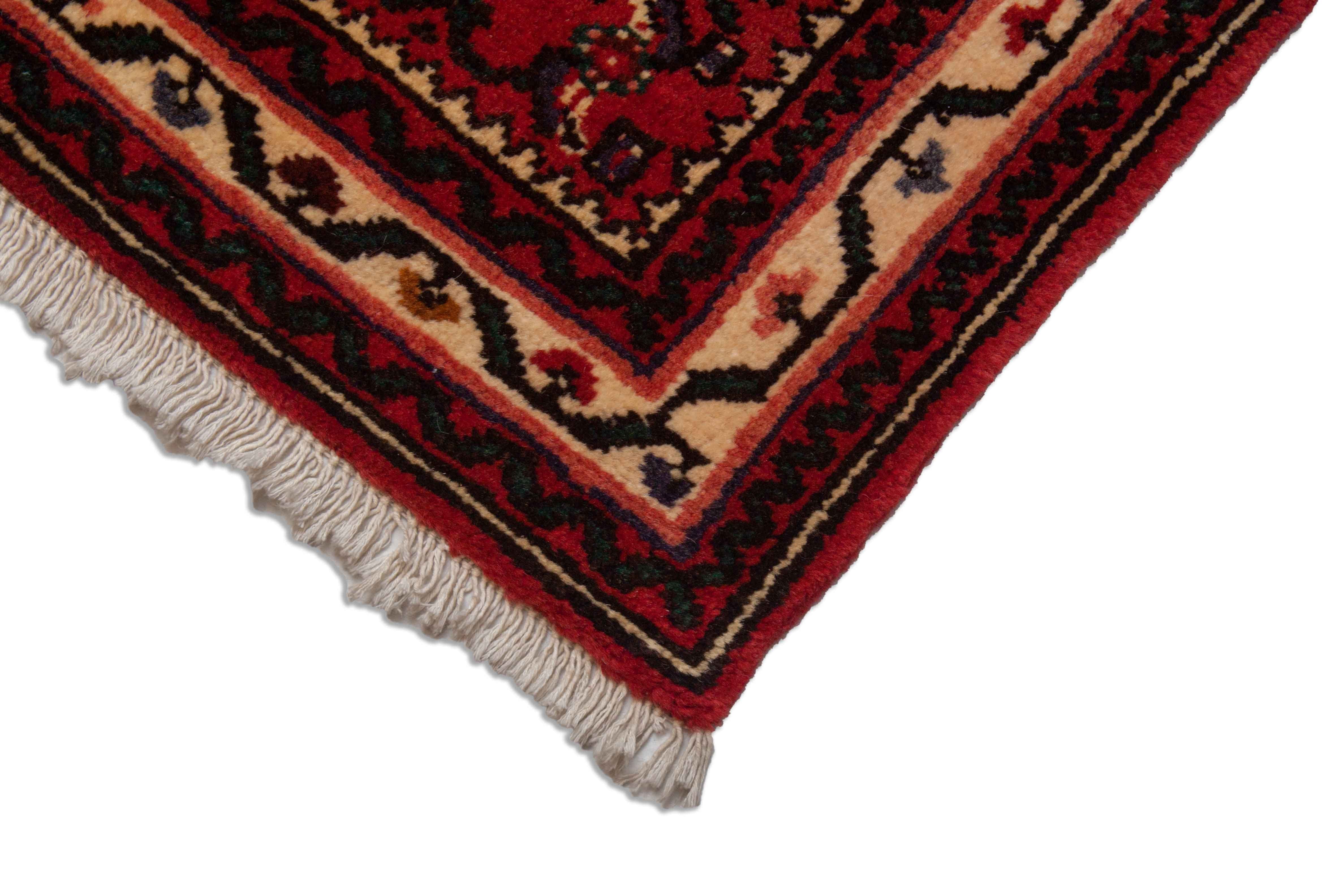 Eine Fotoaufnahme eines Hamadan Teppichs.