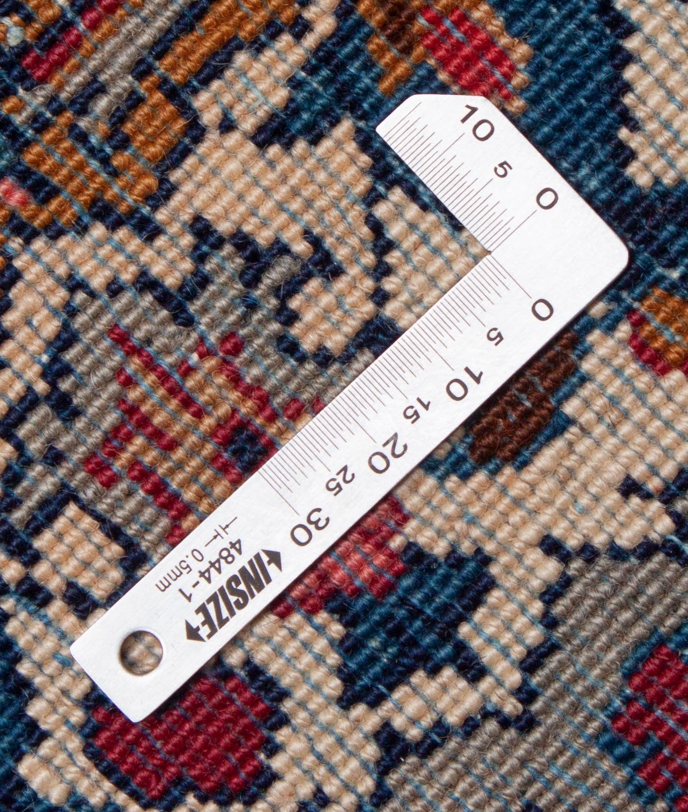 Eine Fotoaufnahme eines Keshan Teppichs.