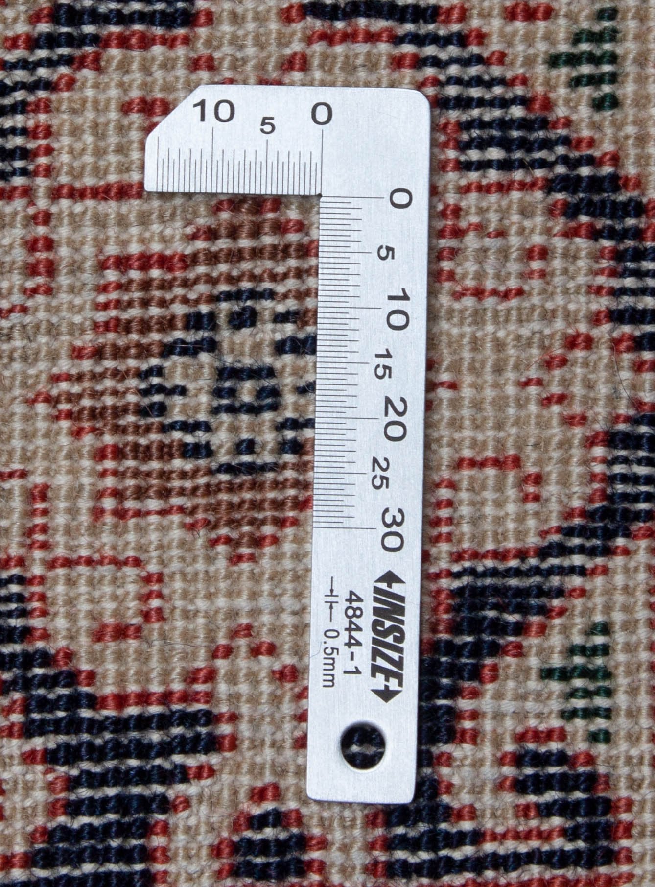 Eine Fotoaufnahme eines Schirwan Teppichs.