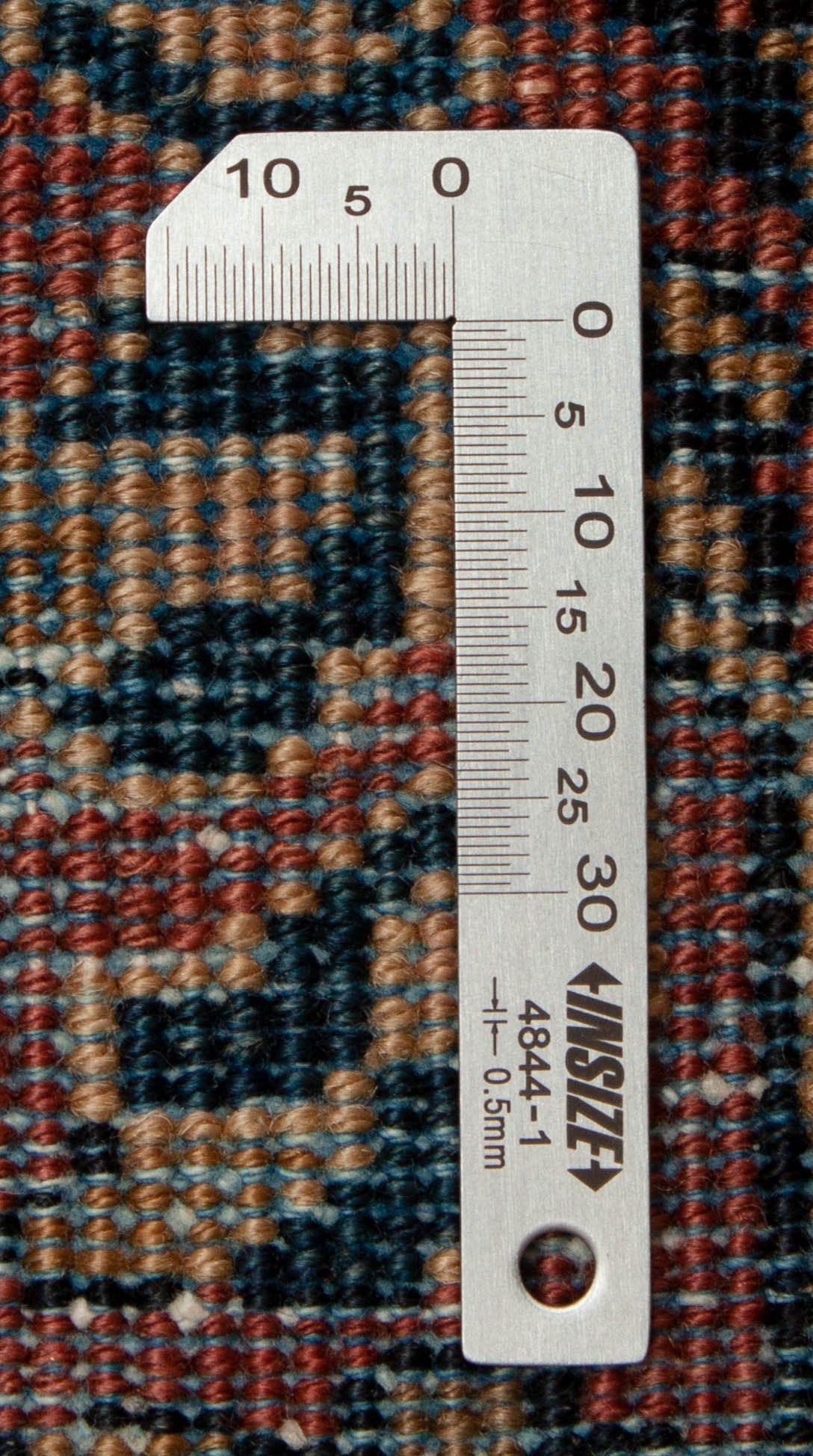 Eine Fotoaufnahme eines Re-Import Sarough Teppichs.