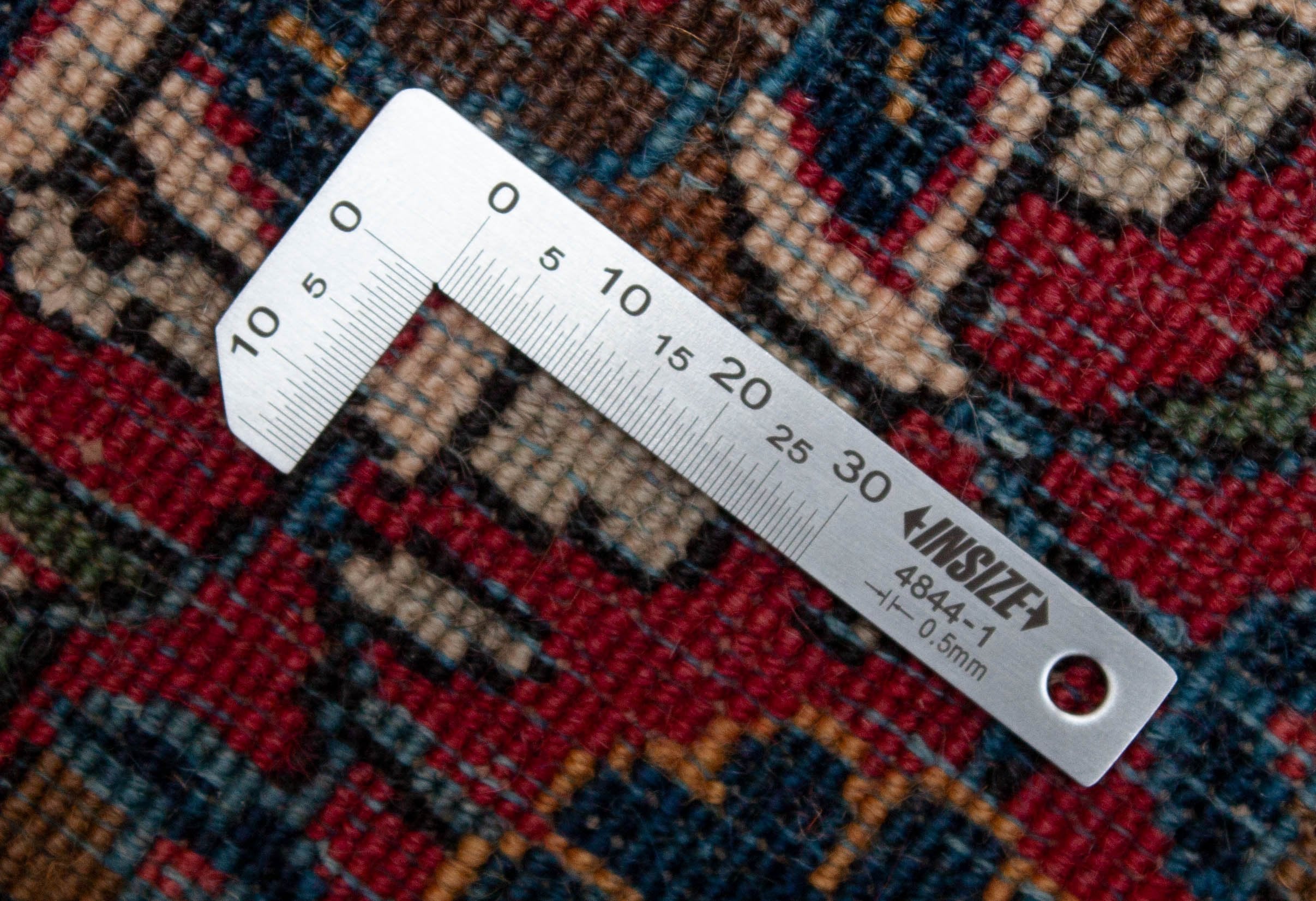 Eine Fotoaufnahme eines Keshan Teppichs.