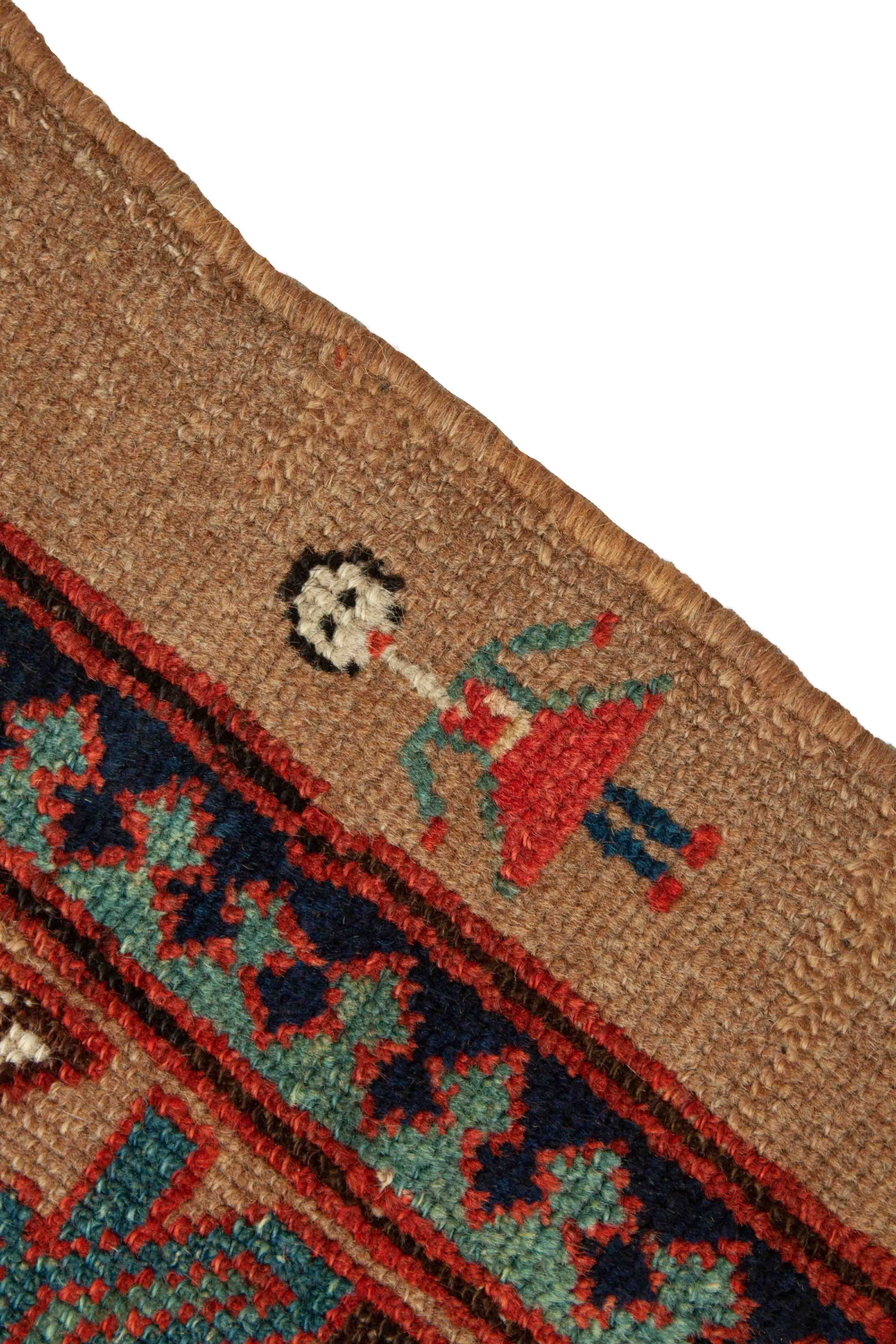 Eine Fotoaufnahme eines Hamadan Teppichs.