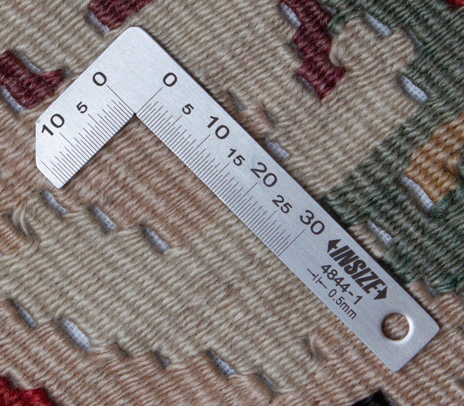 Eine Fotoaufnahme eines Kelim Teppichs.