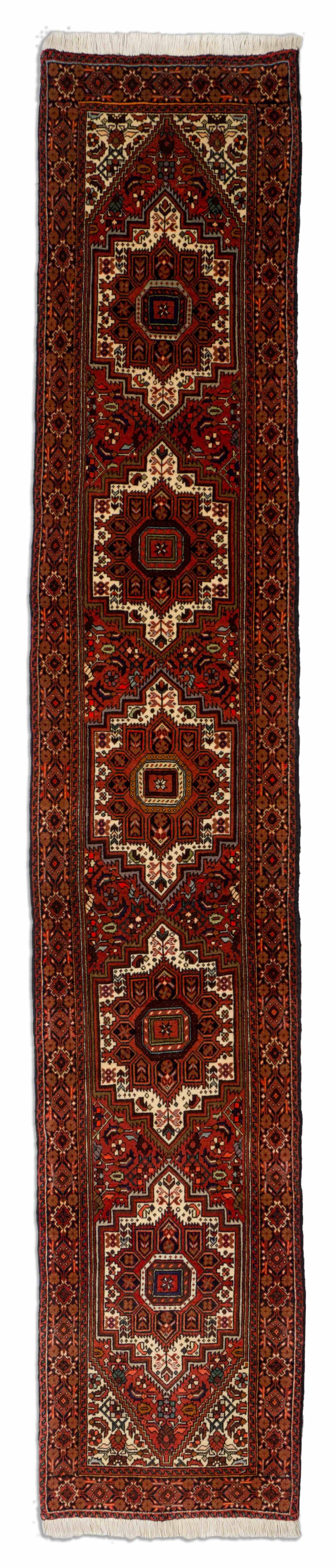 Eine Fotoaufnahme eines Goltogh Teppichs.