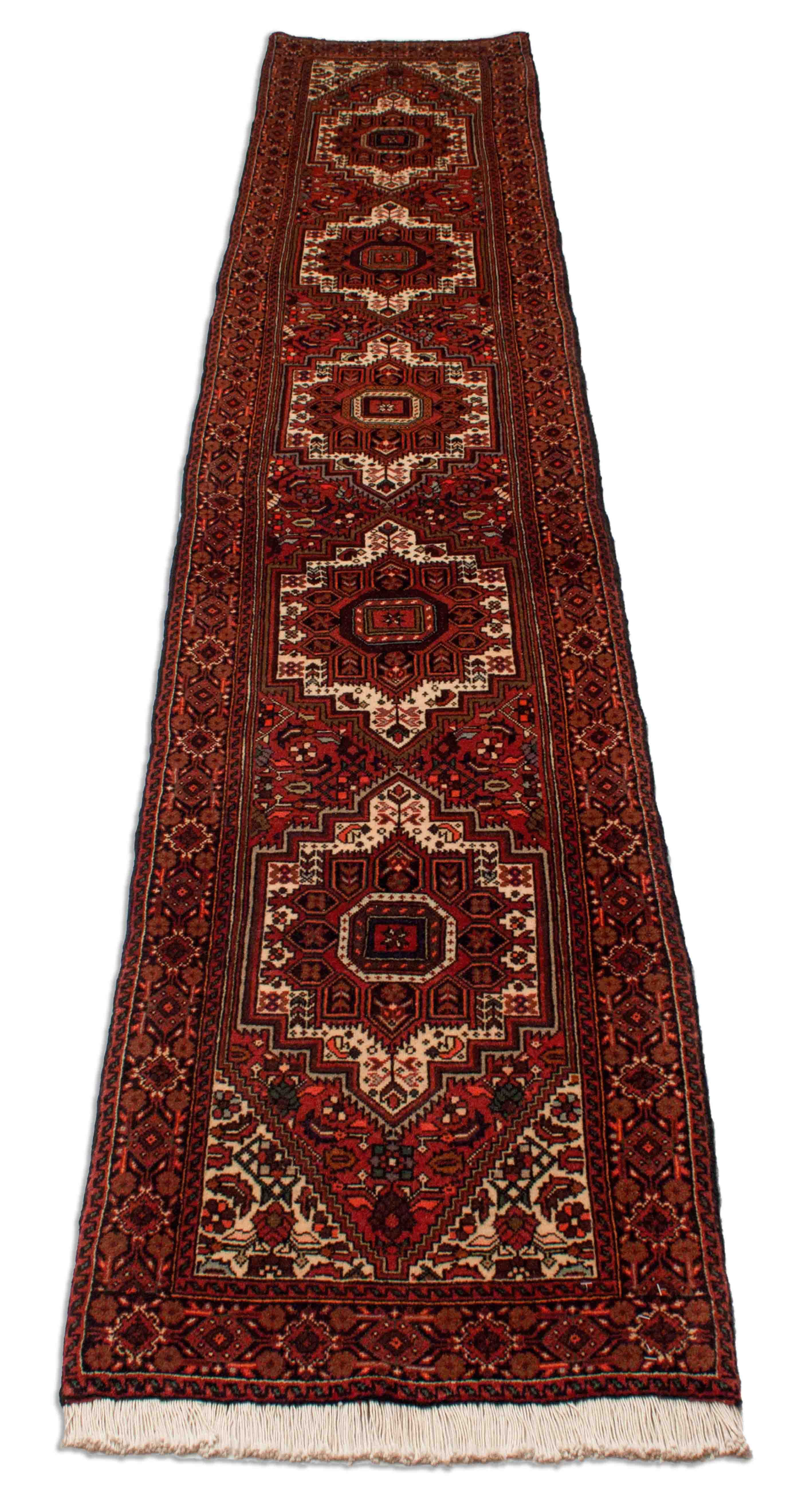 Eine Fotoaufnahme eines Goltogh Teppichs.