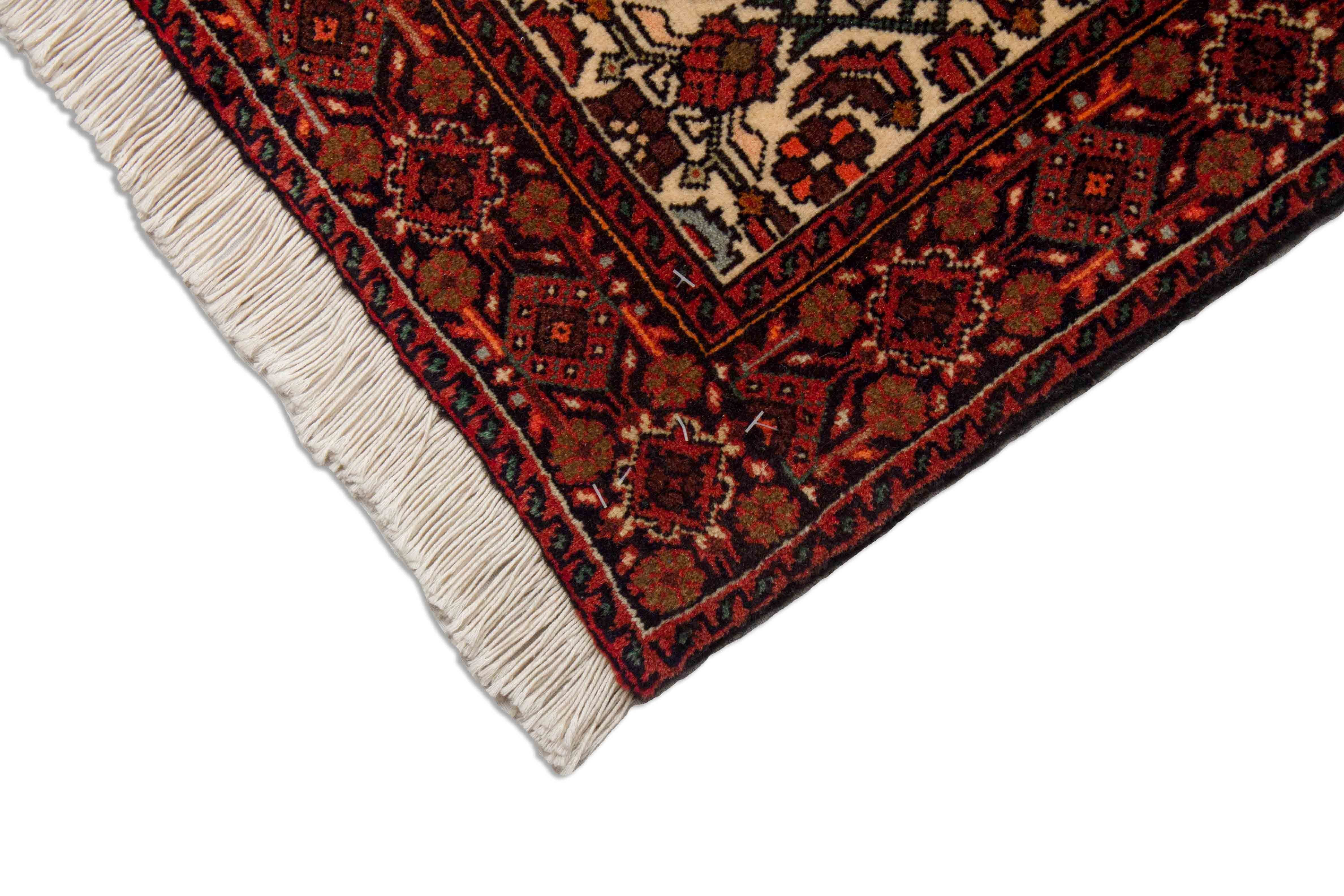 Eine Fotoaufnahme eines Goltogh Teppichs.