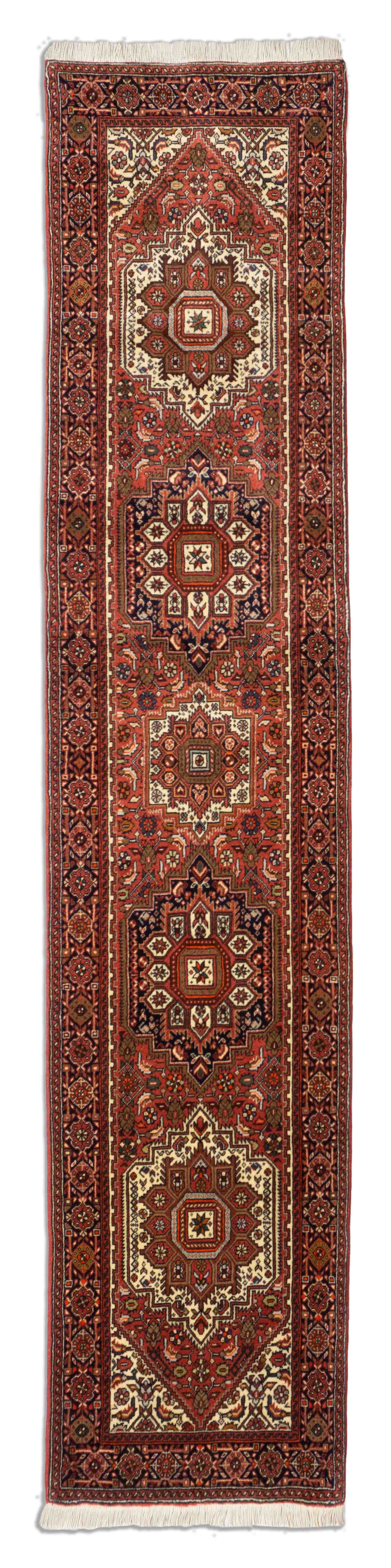 Eine Fotoaufnahme eines Goltogh Teppichs.