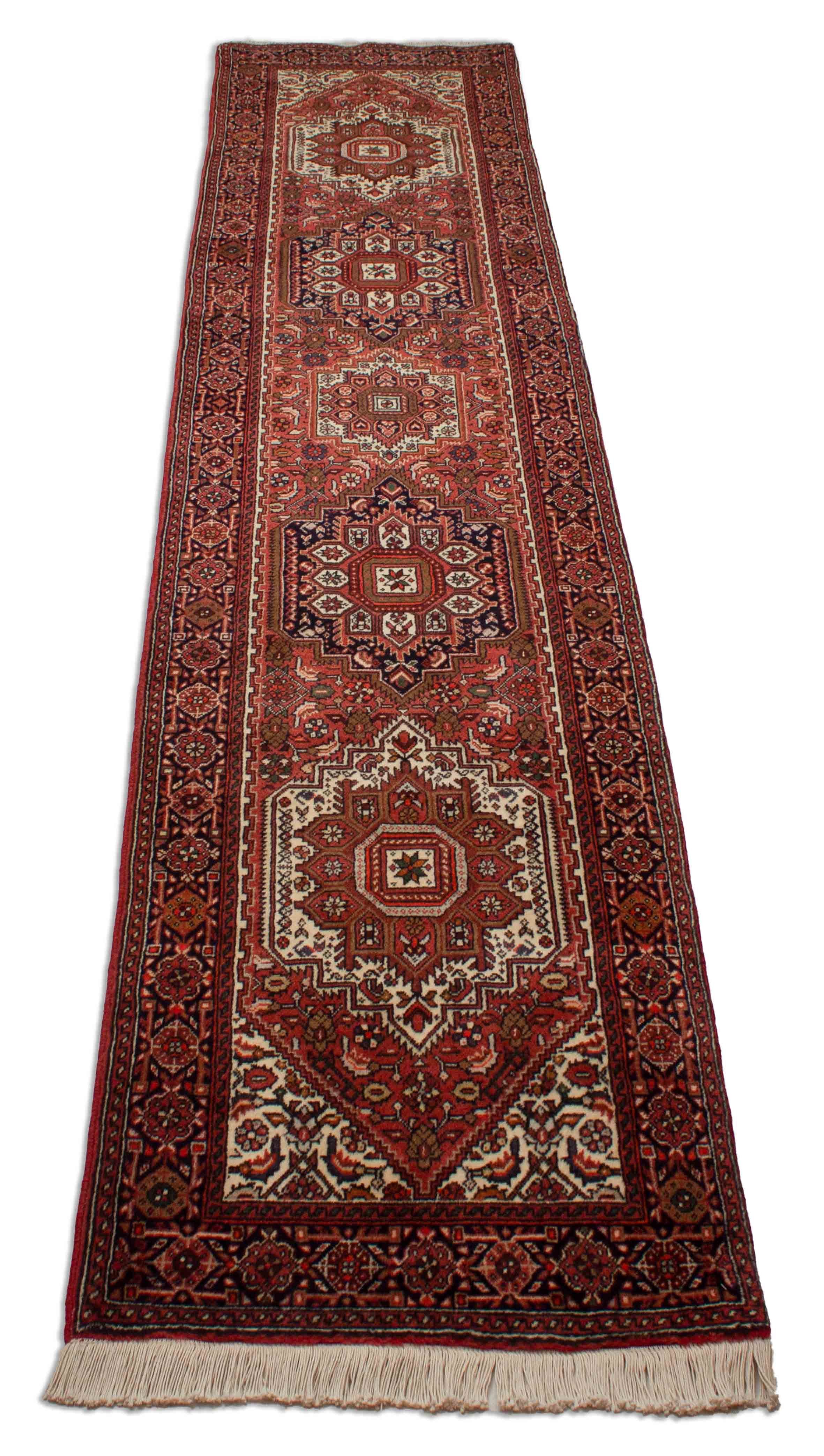 Eine Fotoaufnahme eines Goltogh Teppichs.