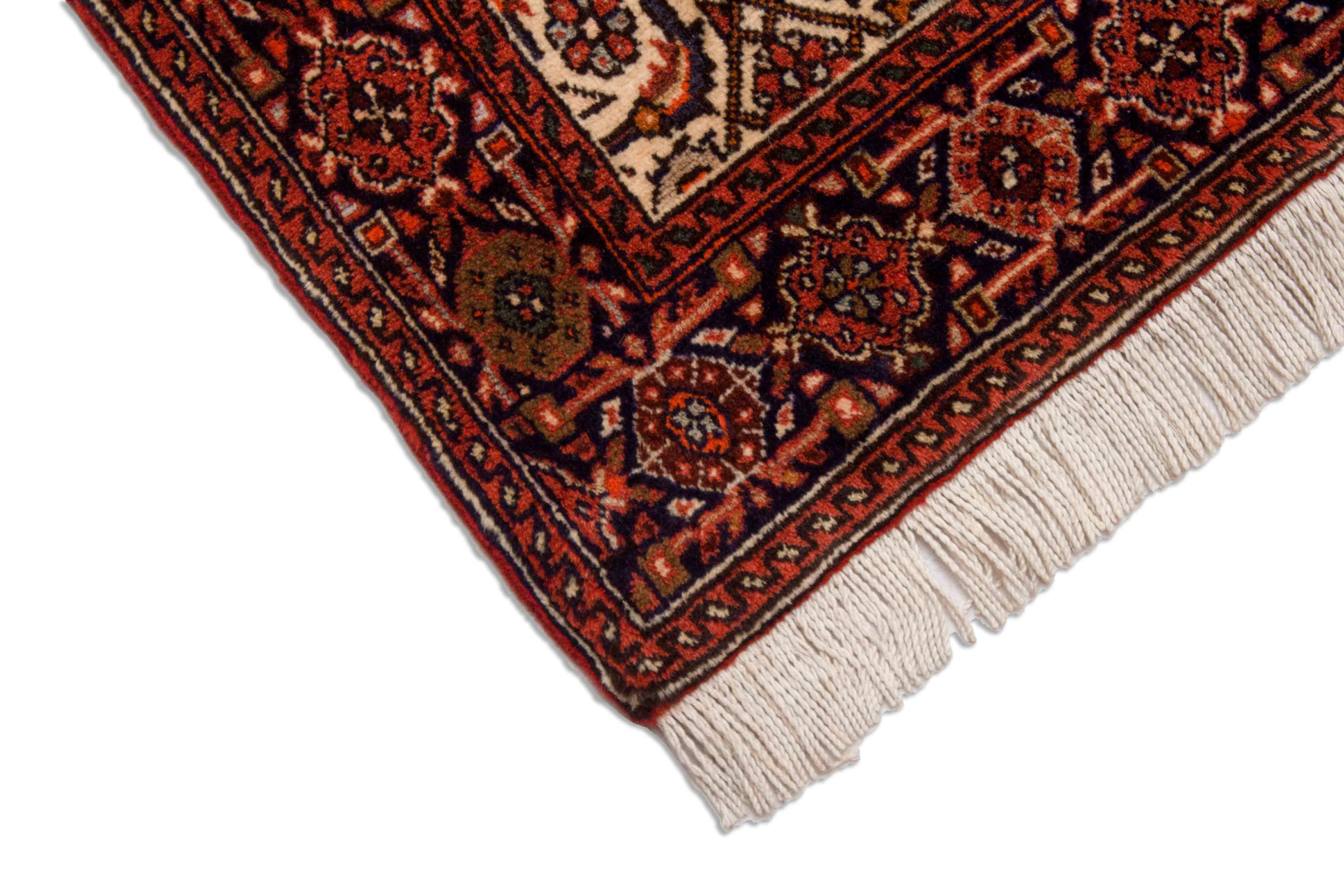 Eine Fotoaufnahme eines Goltogh Teppichs.