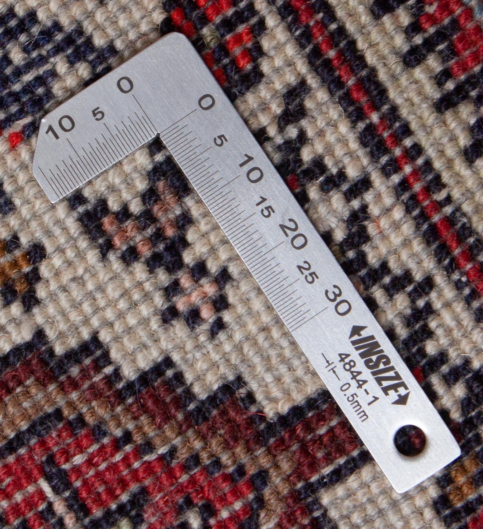 Eine Fotoaufnahme eines Goltogh Teppichs.