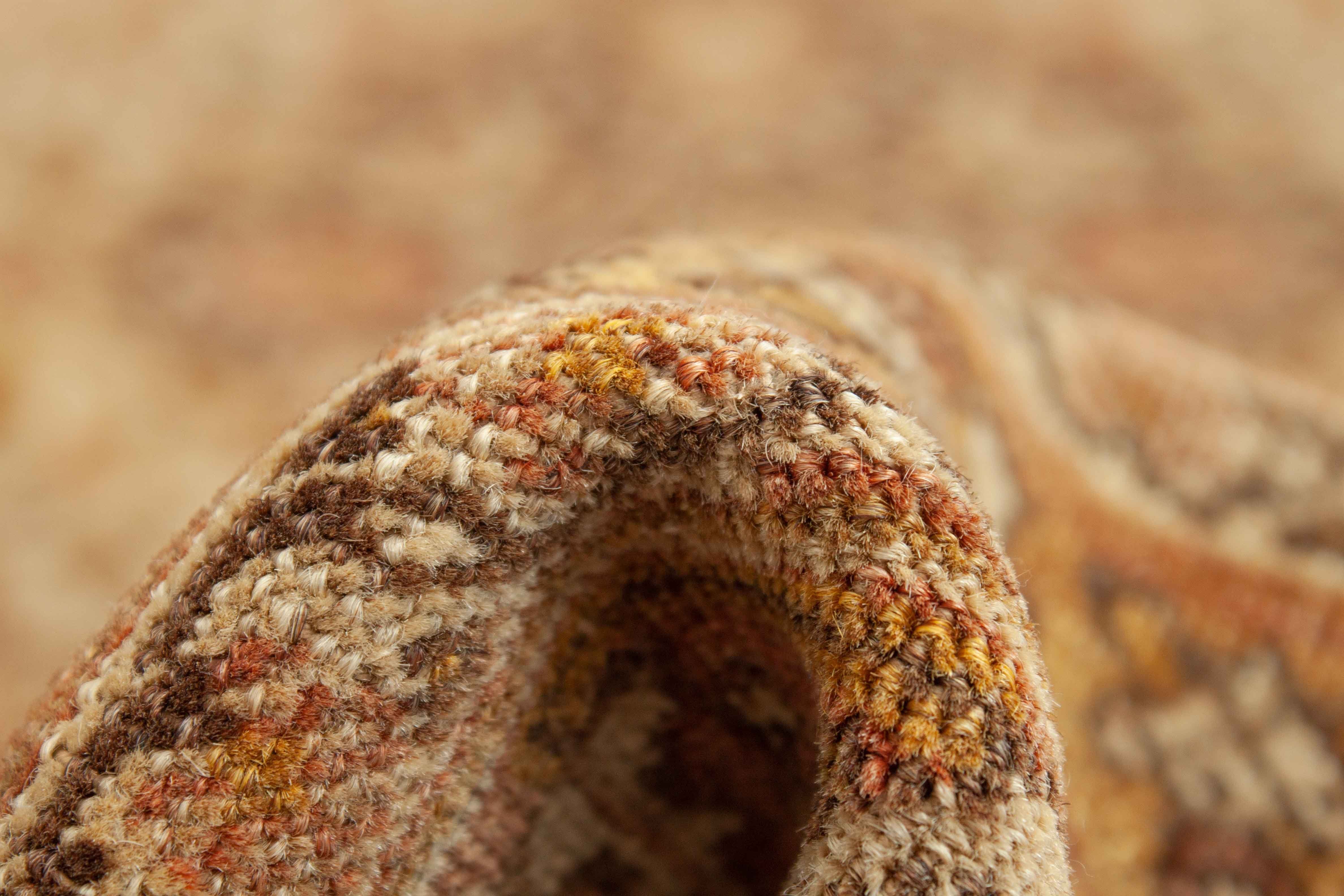 Eine Fotoaufnahme eines Täbriz Teppichs.