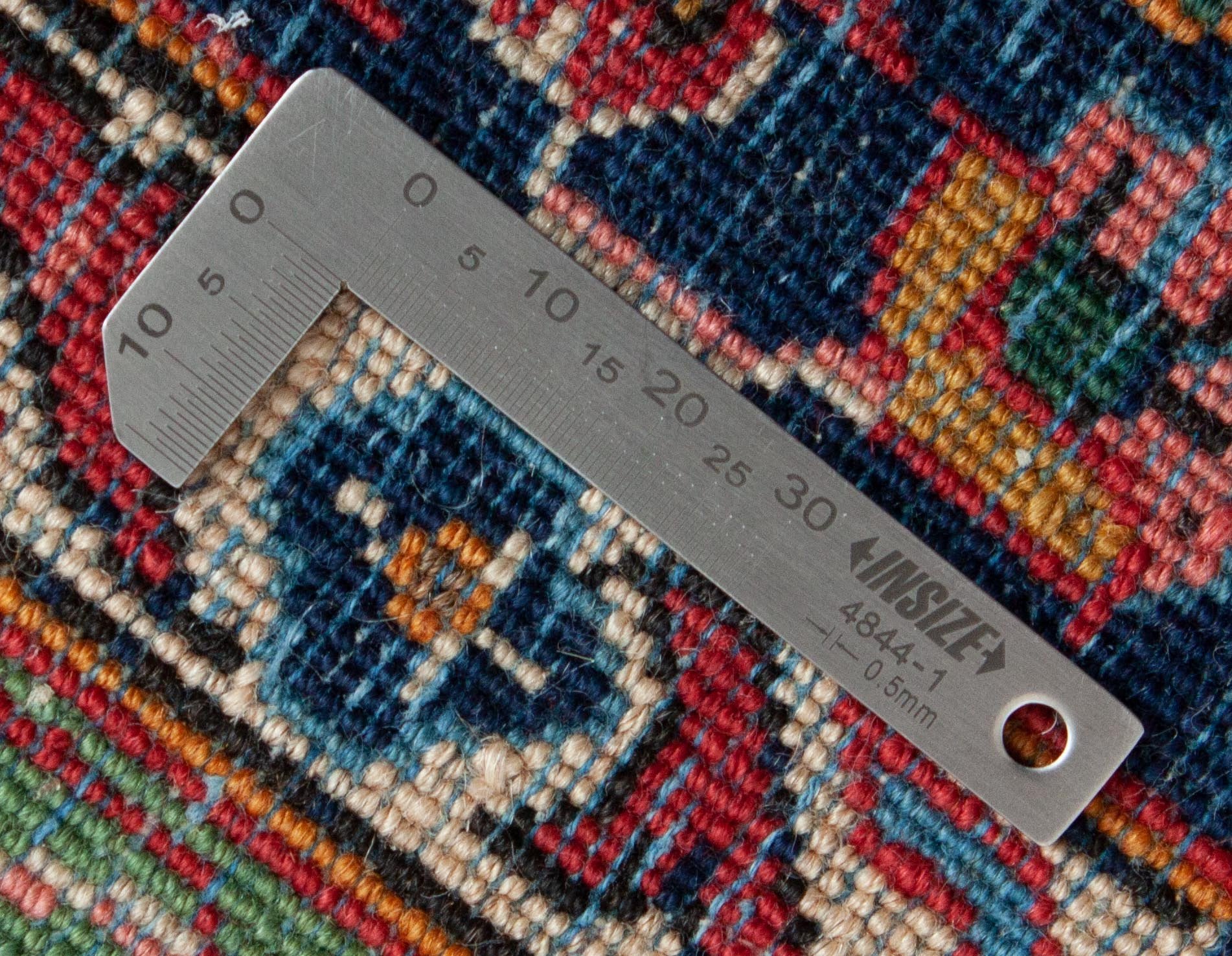 Eine Fotoaufnahme eines Keshan Teppichs.