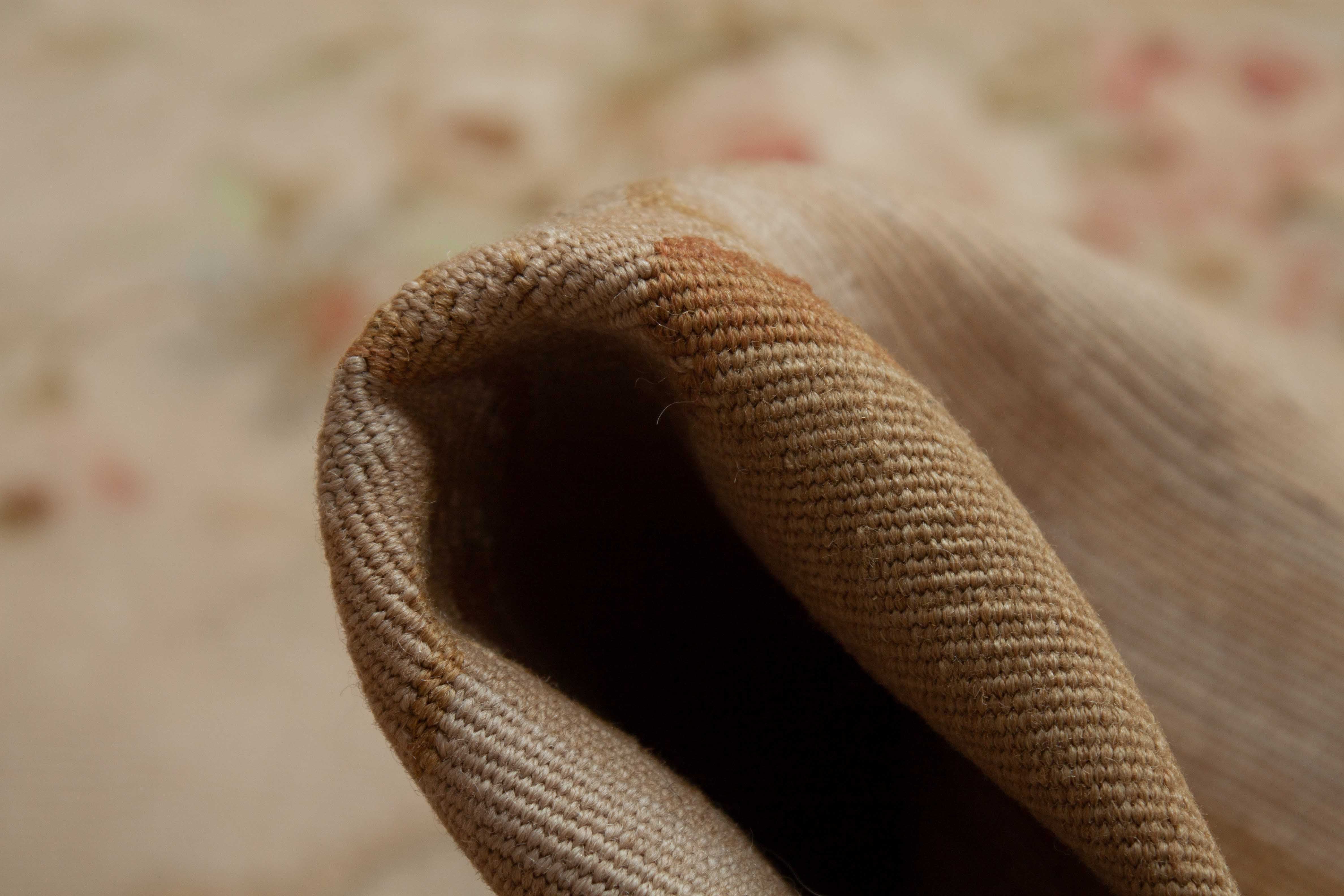 Eine Fotoaufnahme eines Aubusson Teppichs.