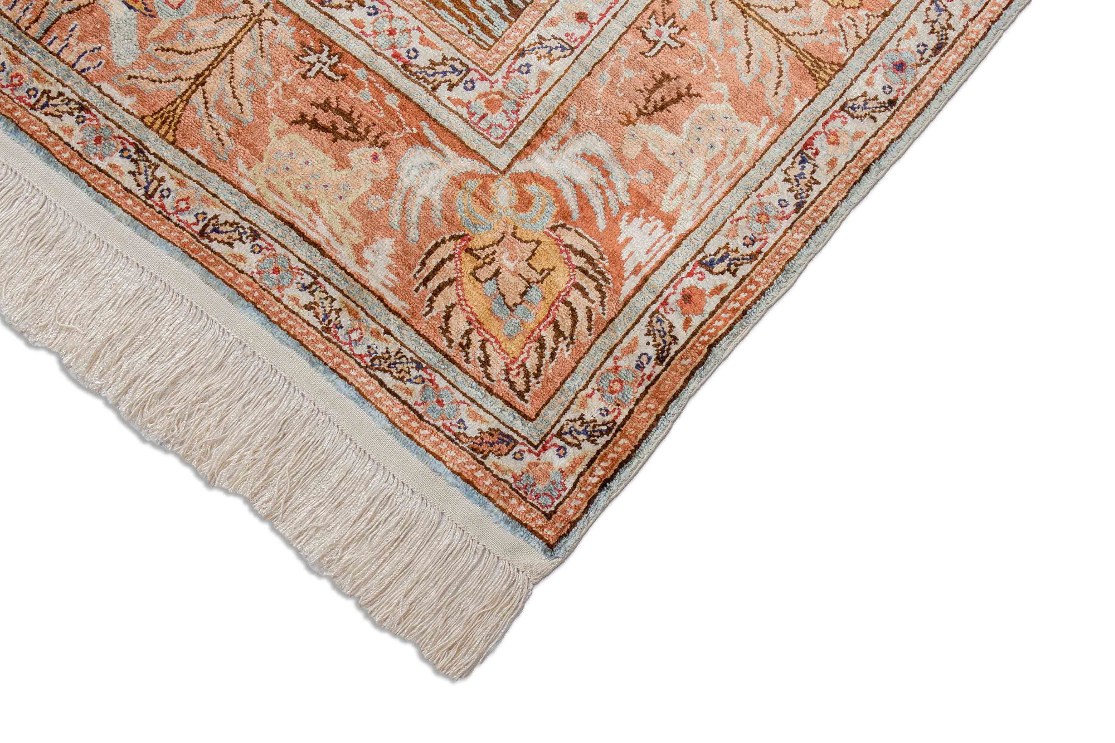 Eine Fotoaufnahme eines Hereke Teppichs.