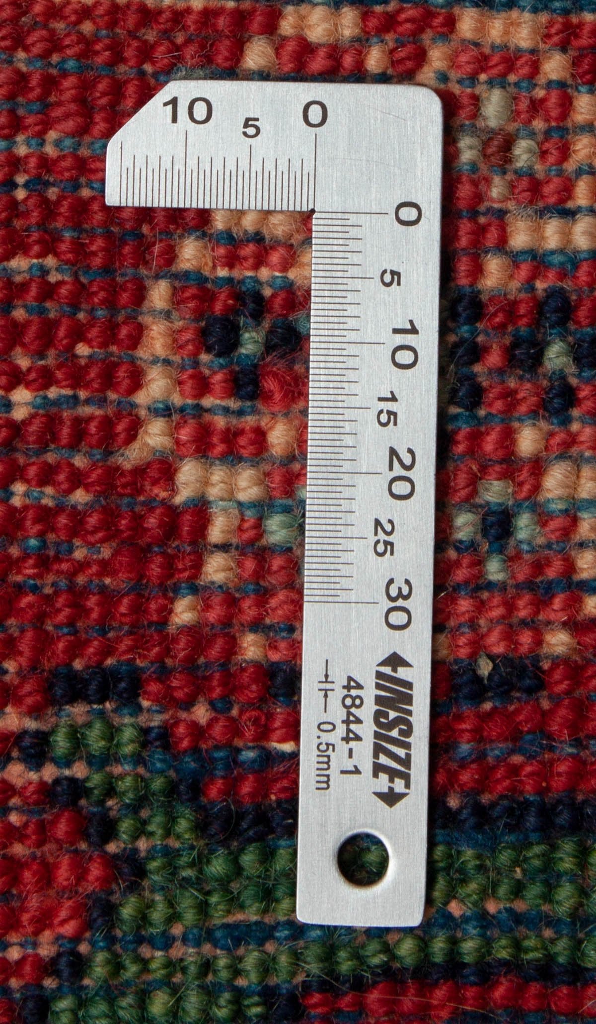 Eine Fotoaufnahme eines Varamin Teppichs.