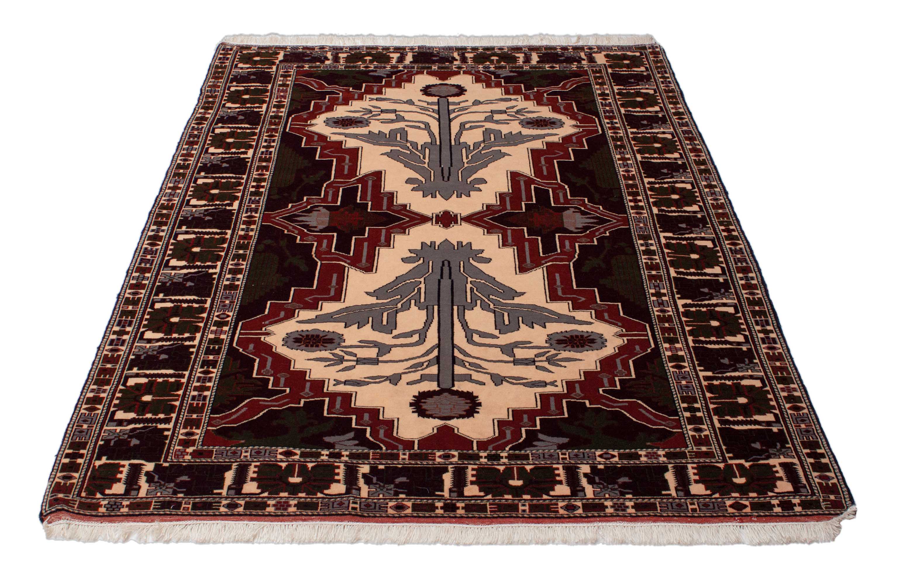 Eine Fotoaufnahme eines Turkmenischer Teppich Teppichs.