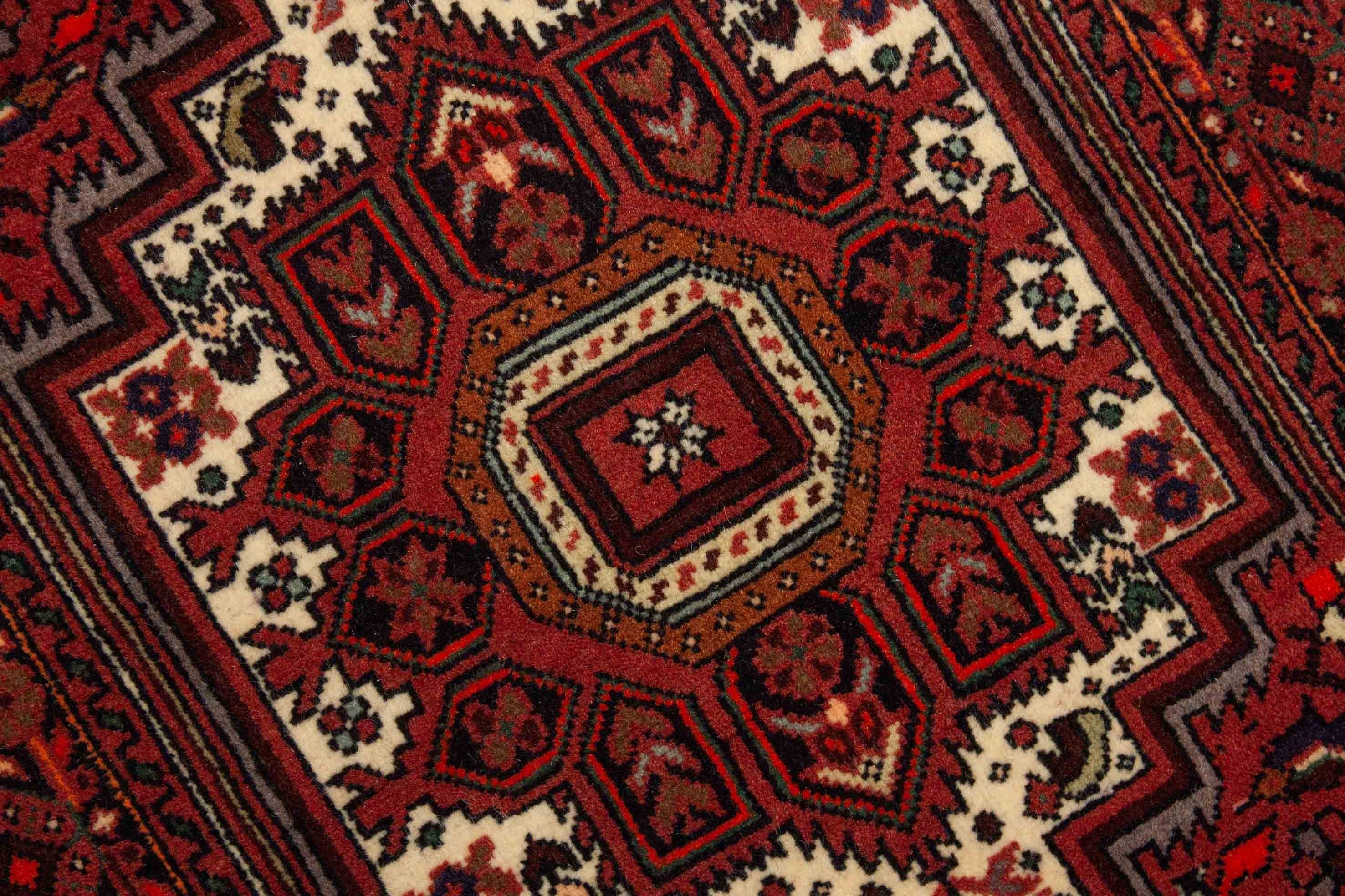 Eine Fotoaufnahme eines Goltogh Teppichs.
