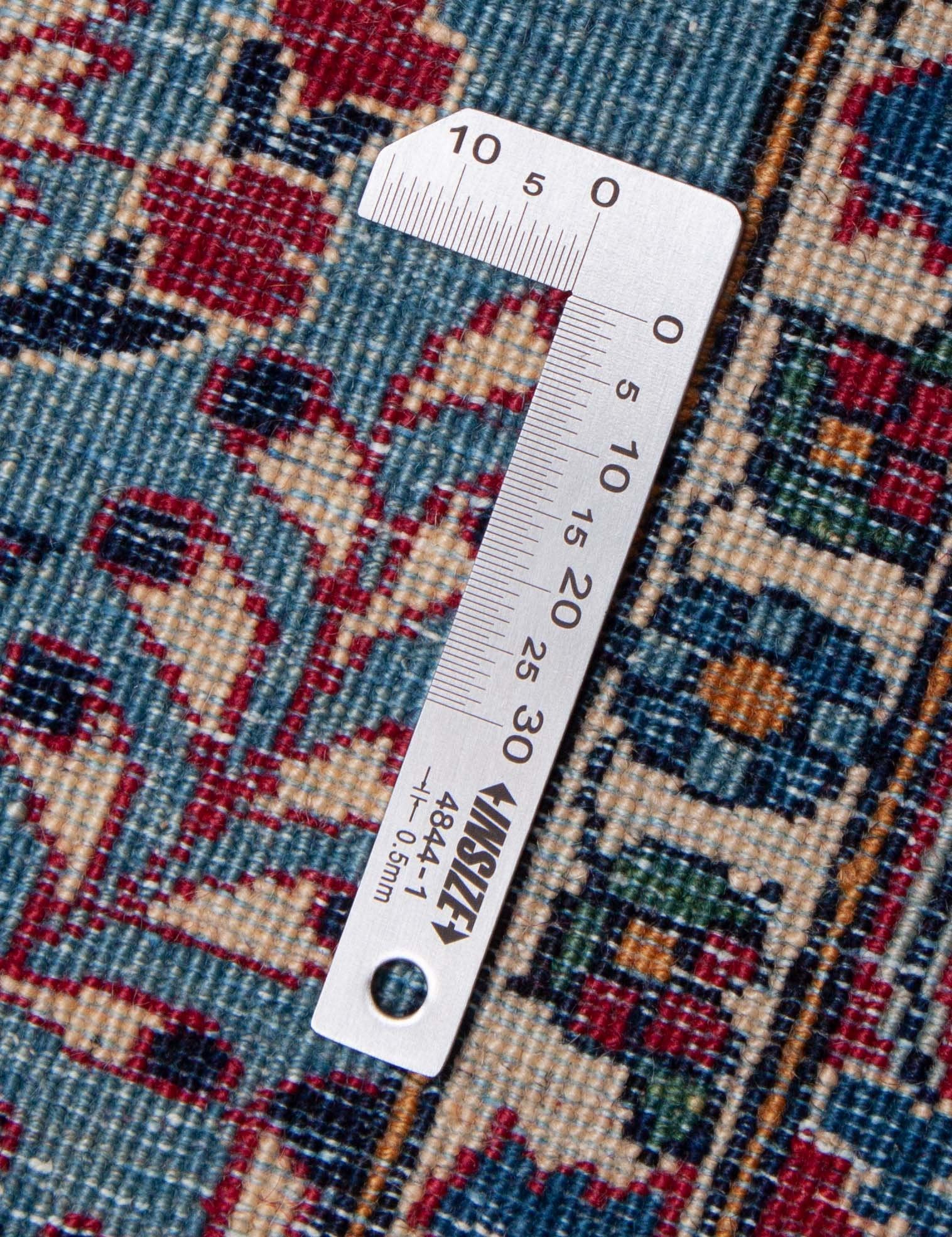 Eine Fotoaufnahme eines Nain Teppichs.